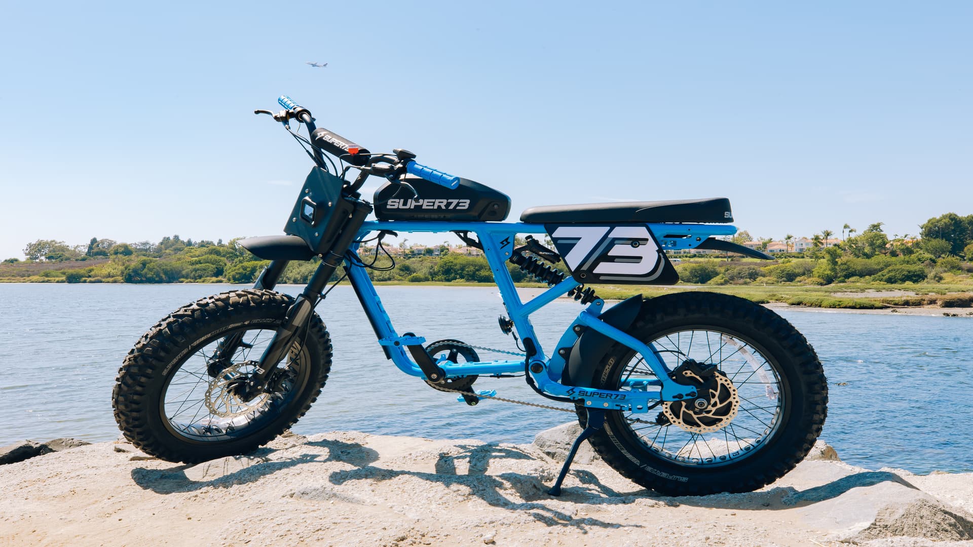 Super73 Blu Tang ebike parked by the lake