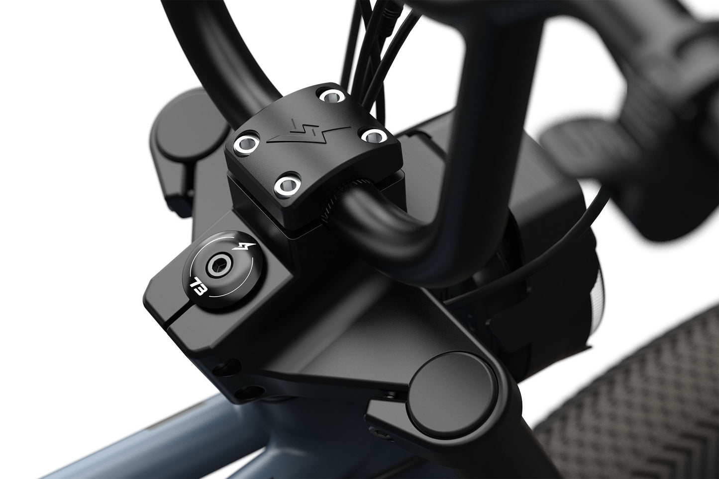 Close-up of a super 73 electric bicycle handlebar control unit with buttons on a blurred background