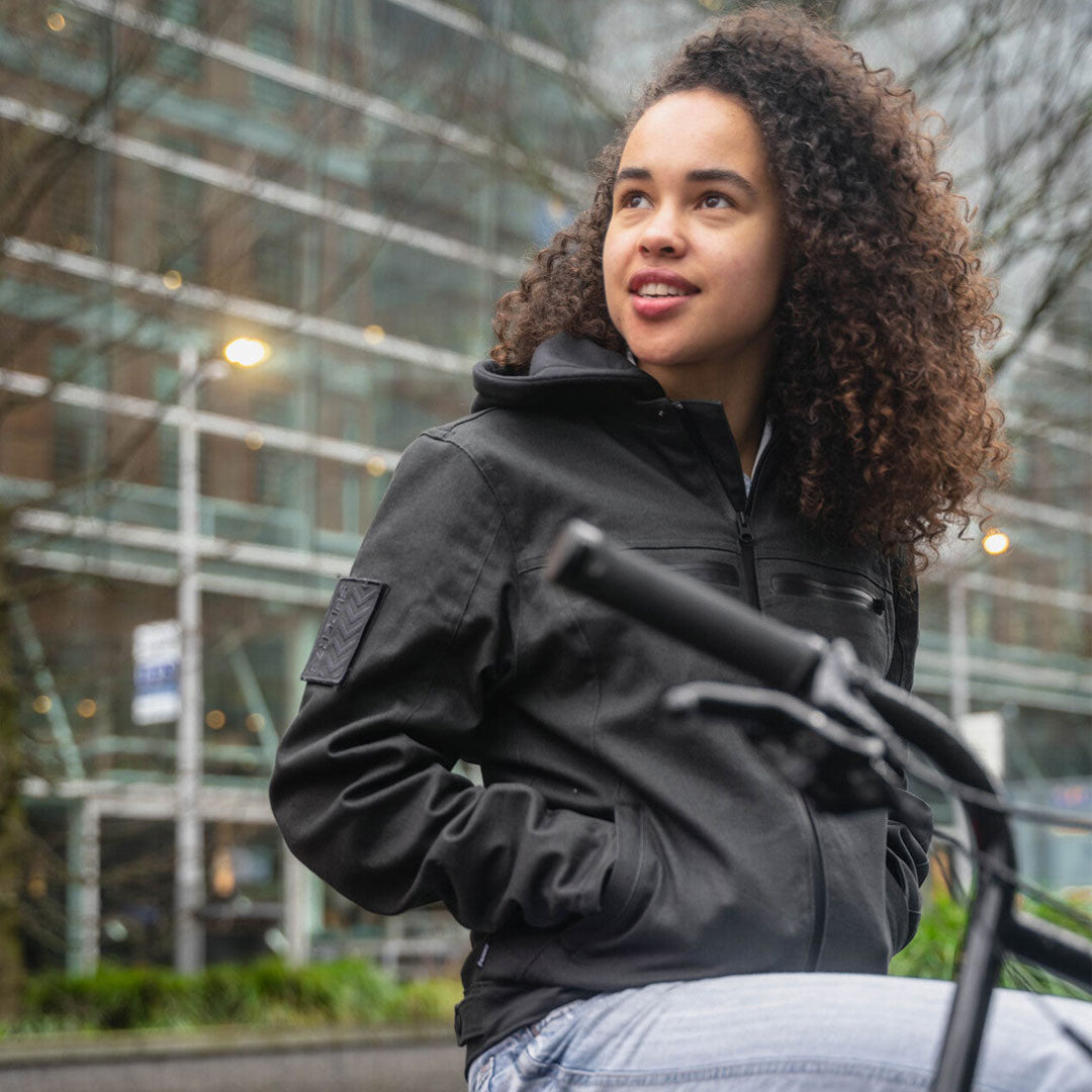 Model wearing a Super73 and Field Research Division Collection Chisel Jacket