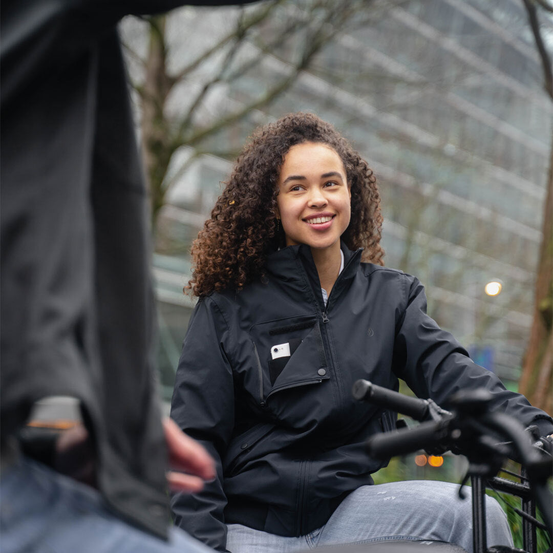 Model wearing a Super73 and Field Research Division Collection Royce Jacket Black