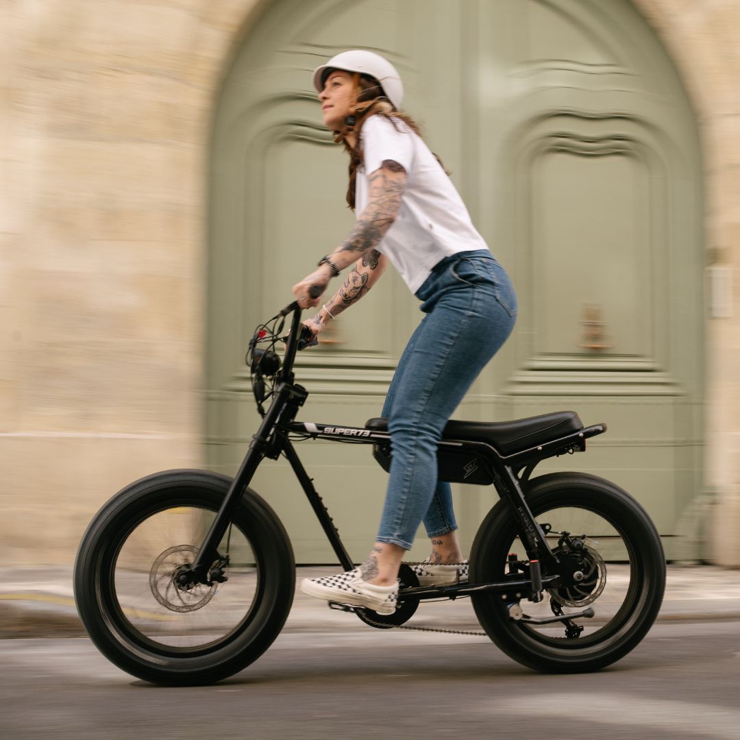 Girl riding a Super73-ZX Obsidian  ebike in Paris