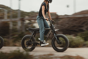 Lifestyle shot of the Super73-Z Adventure ebike in the color Sandstorm