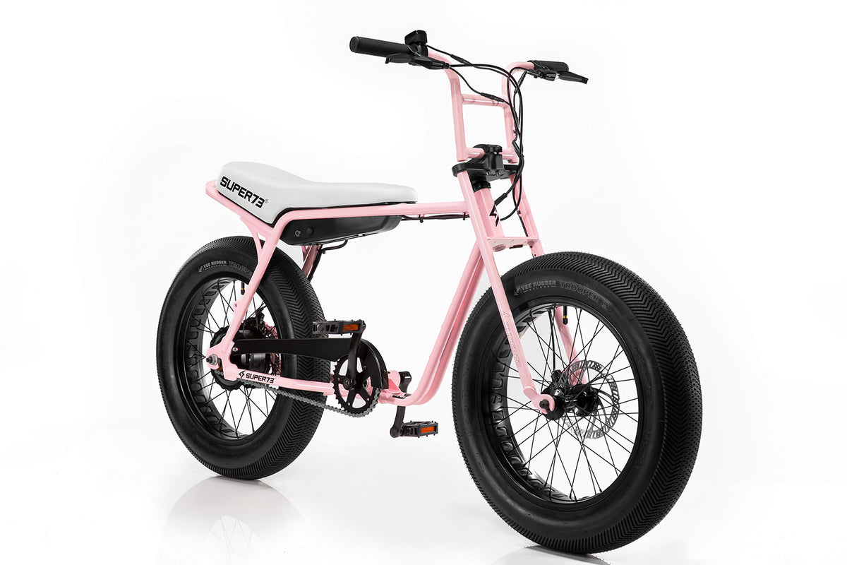 Angled studio shot of Pink bike model. @color_millennial pink